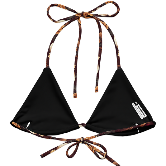 memento bloom string bikini top featuring hauntingly beautiful skulls with lush, full-bodied roses and golden sunflowers against a rich burgundy backdrop