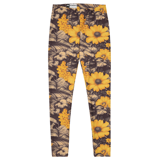 front view of premium women's leggings with Deadly Petals print which features a surreal collision of vivid golden blooms and shadowy skulls hidden in a jungle of inked leaves